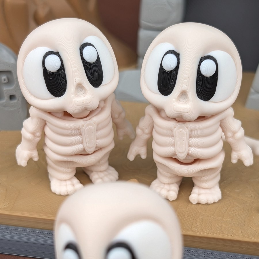3D printed mini skeletons, poseable Halloween figures